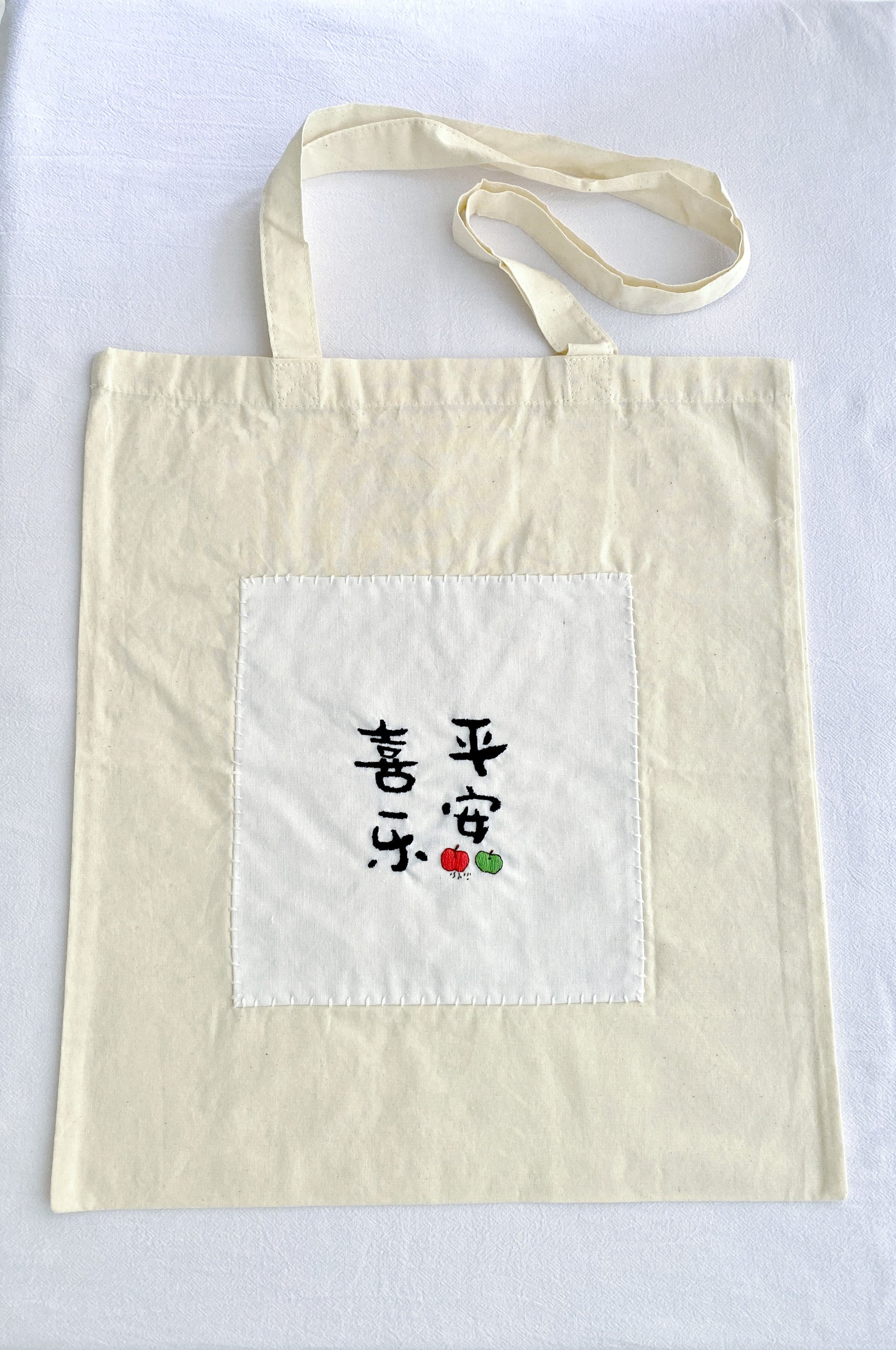 casual shoulder bag with cultural embroidery accent