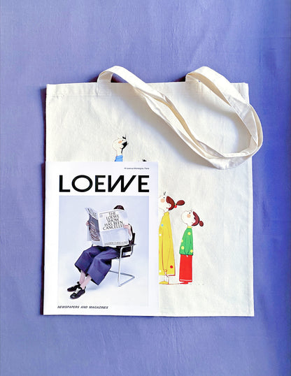 This tote bag, featuring a hand-printed family motif, offers both practicality and emotional value for sustainable living.