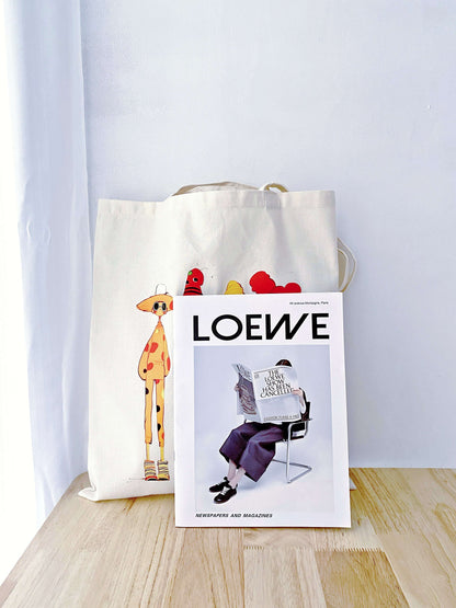 Washable reusable grocery bag with artistic female friendship motif