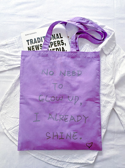 Versatile slouchy shoulder bag for carrying laptops and daily essentials sustainably.