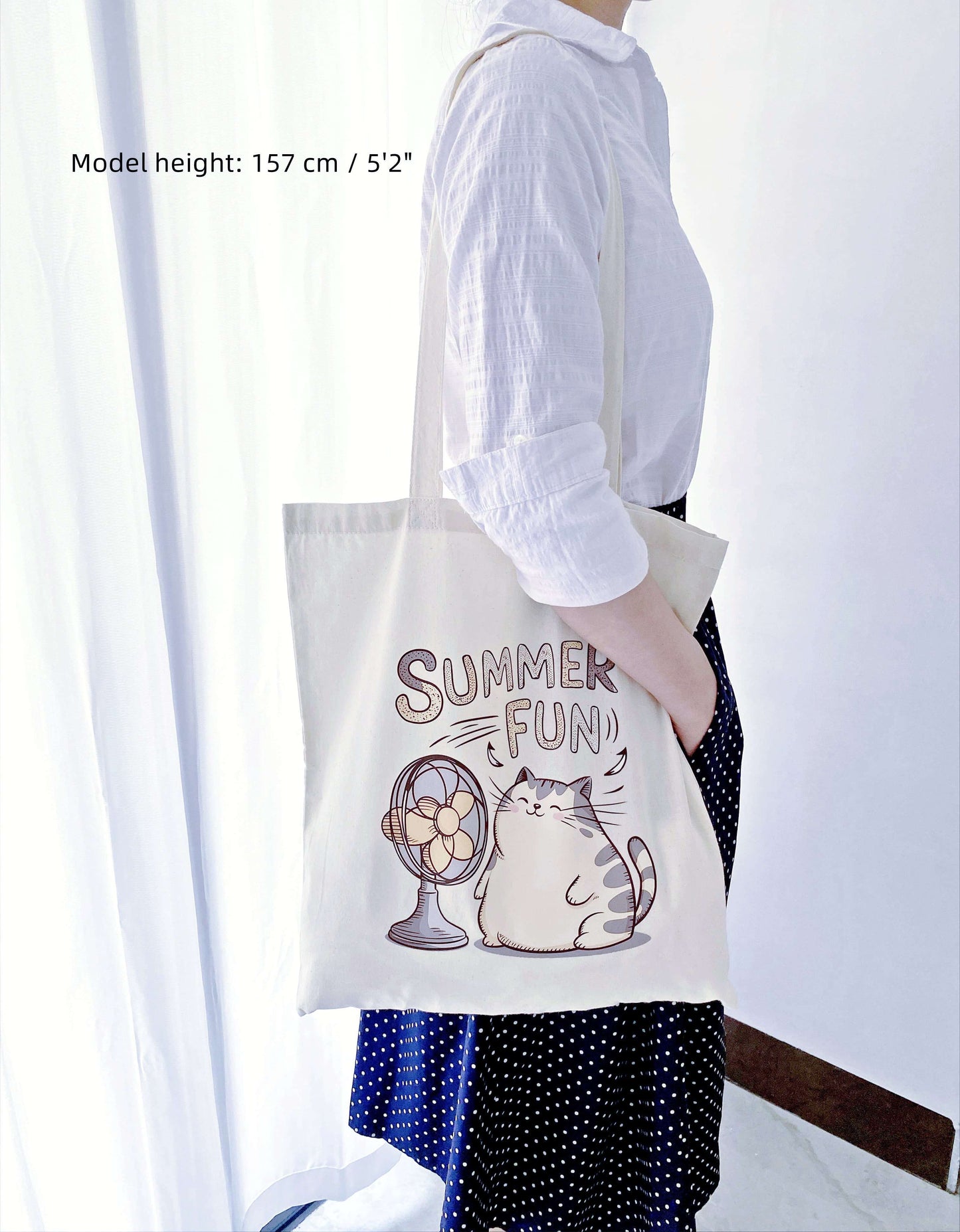 Soft, oversized tote with a hand-printed kitty – a versatile piece for anyone who enjoys cute, functional accessories.