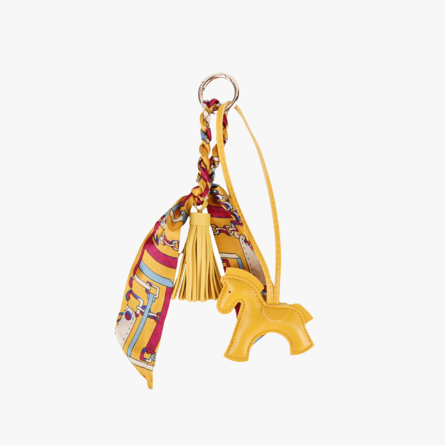 Little horse charm hanging from a women's handbag