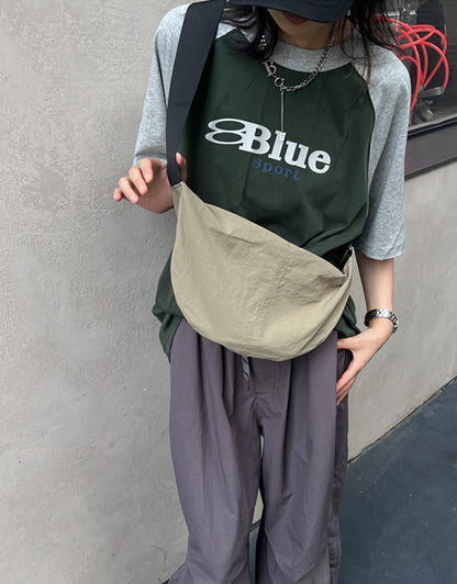 Small chest sling for hands-free travel