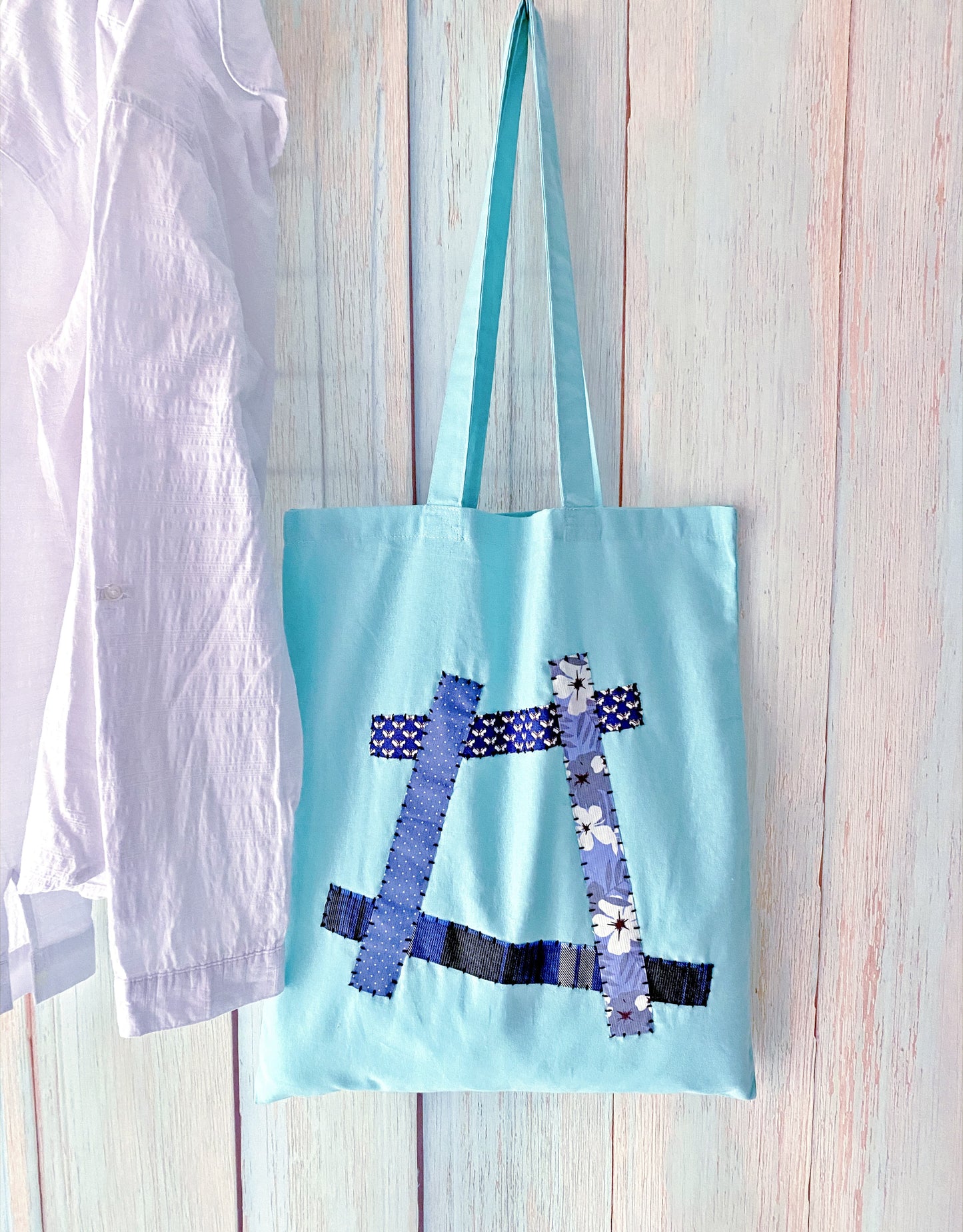 minimal tote bag styled for coffee shop mornings