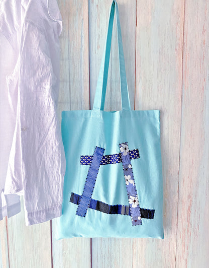 minimal tote bag styled for coffee shop mornings