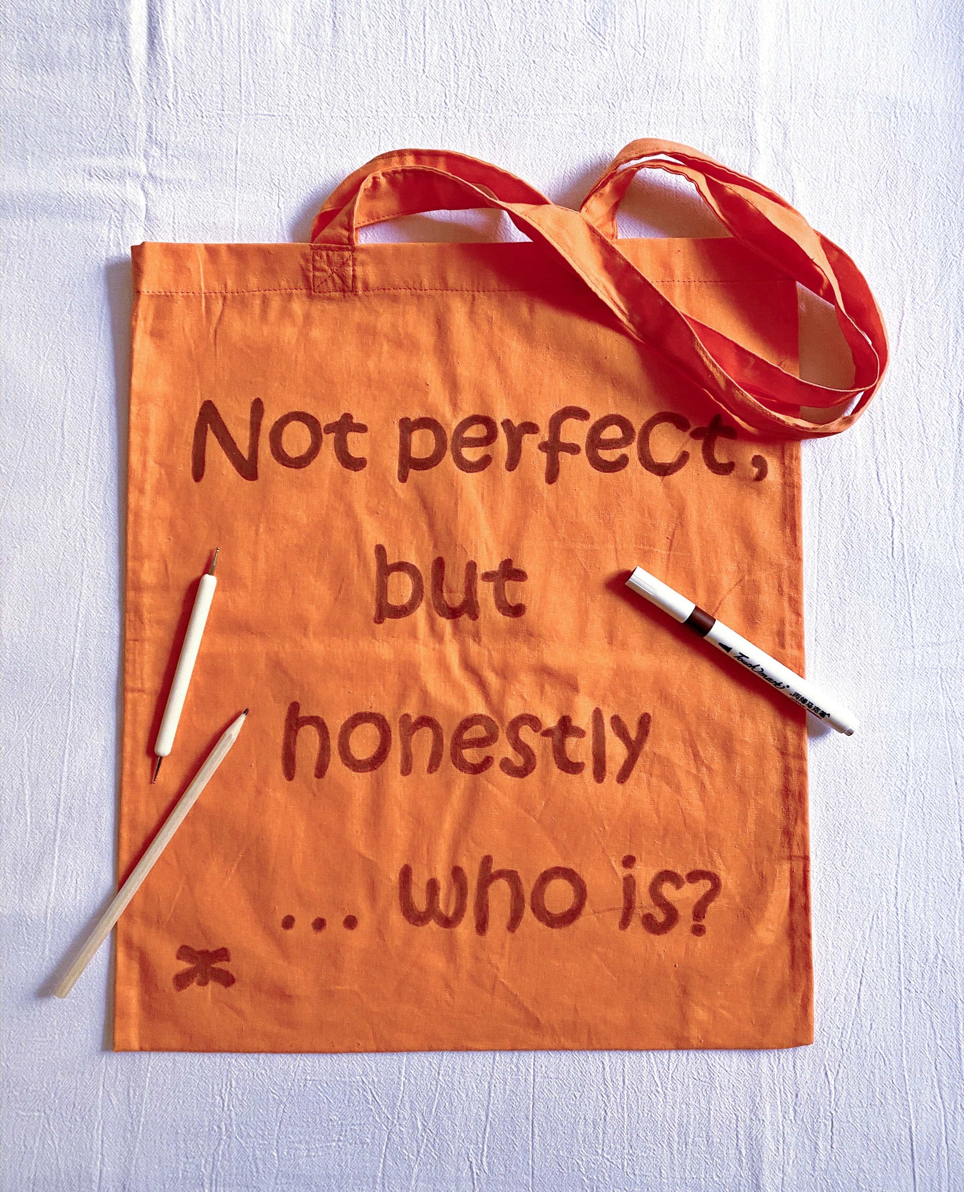 handmade orange tote with personalized lettering