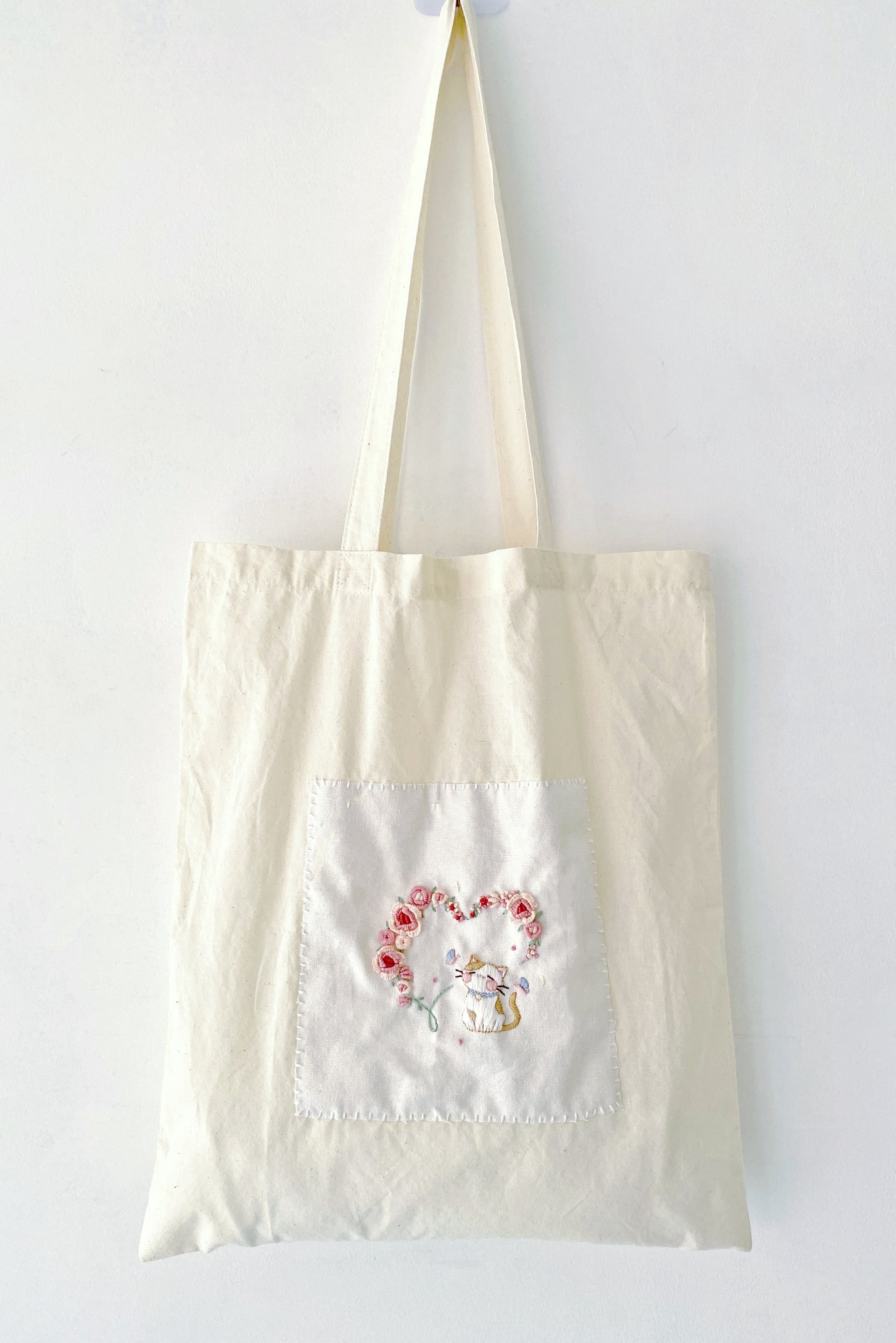 The large, durable cotton bag is an excellent back-to-school or graduation present.