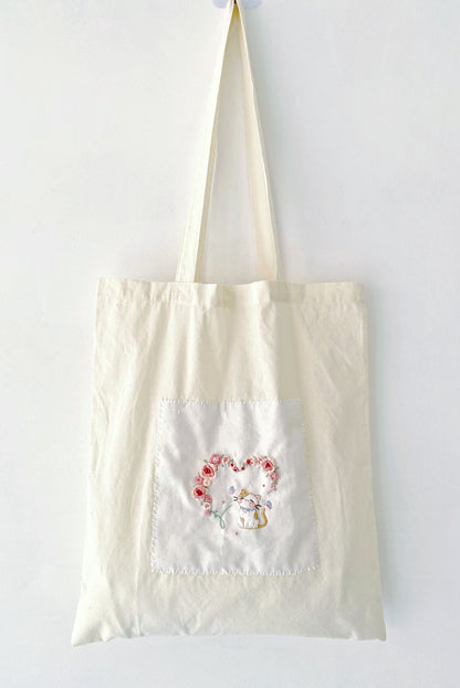 The large, durable cotton bag is an excellent back-to-school or graduation present.