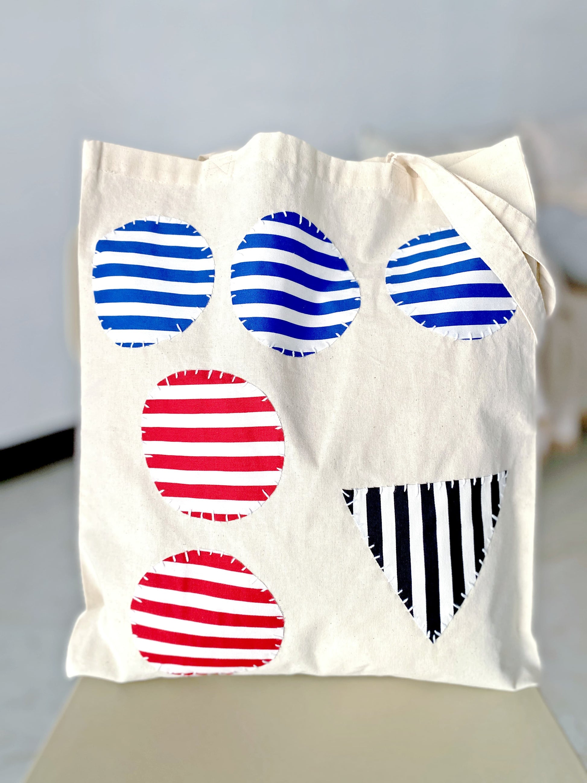 Unique design tote appealing to people who love personalized fashion and style.