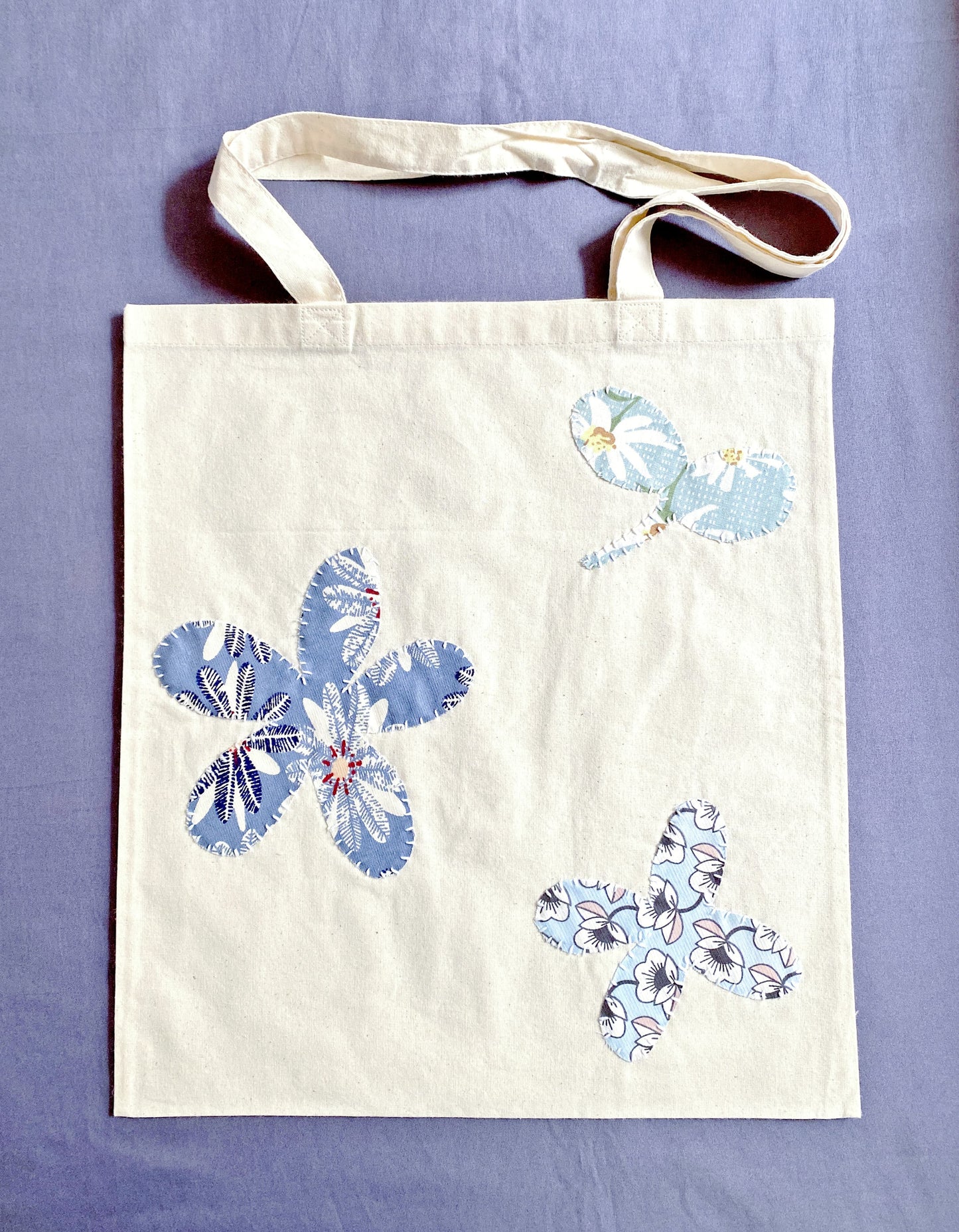 Close-up of the supersoft cotton fabric and creative patchwork stitching detail.