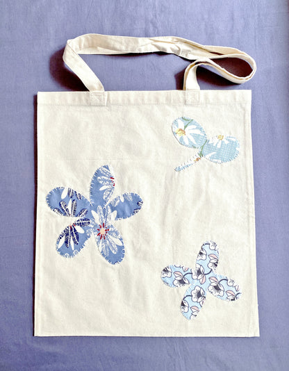 Close-up of the supersoft cotton fabric and creative patchwork stitching detail.