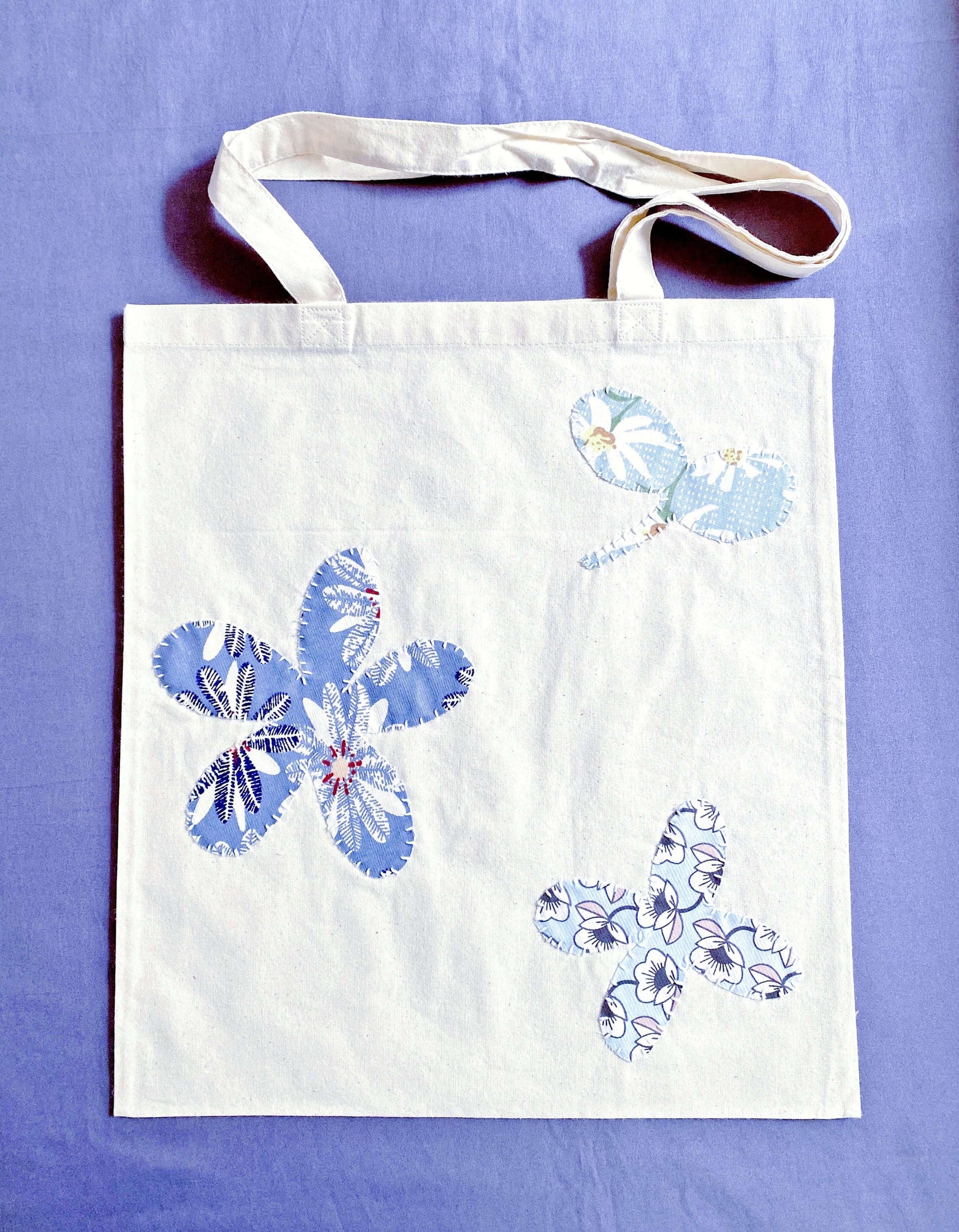 Soft cotton tote with hand-stitched patchwork detail, often chosen by Europeans who prefer lightweight bags that feel calm, practical, and aligned with sustainable daily routines