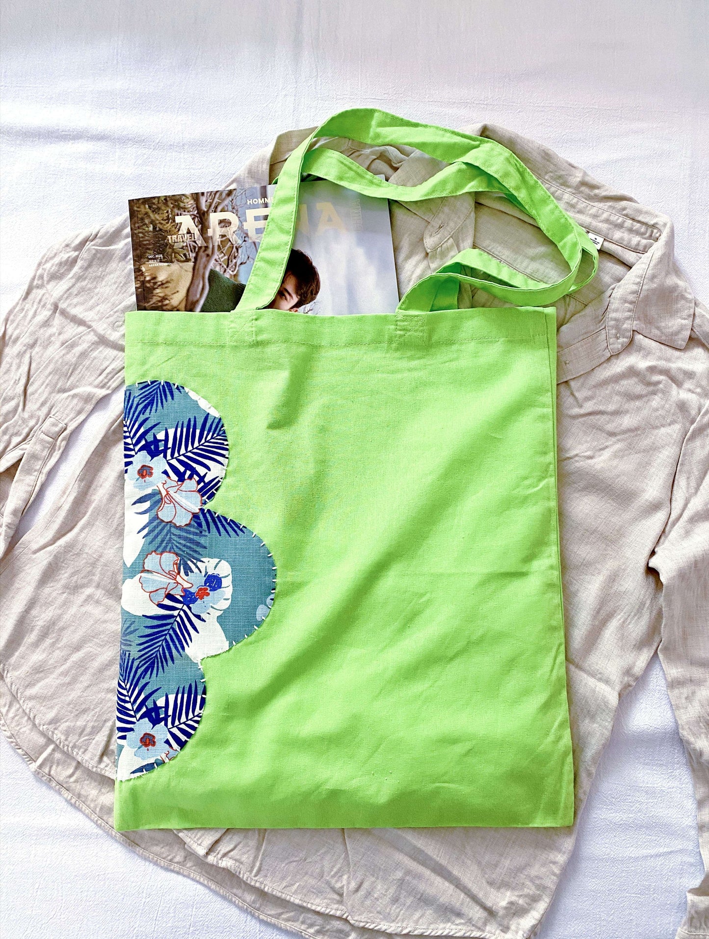 Lightweight oversized fabric bag featuring hand-stitched patterns for mindful living