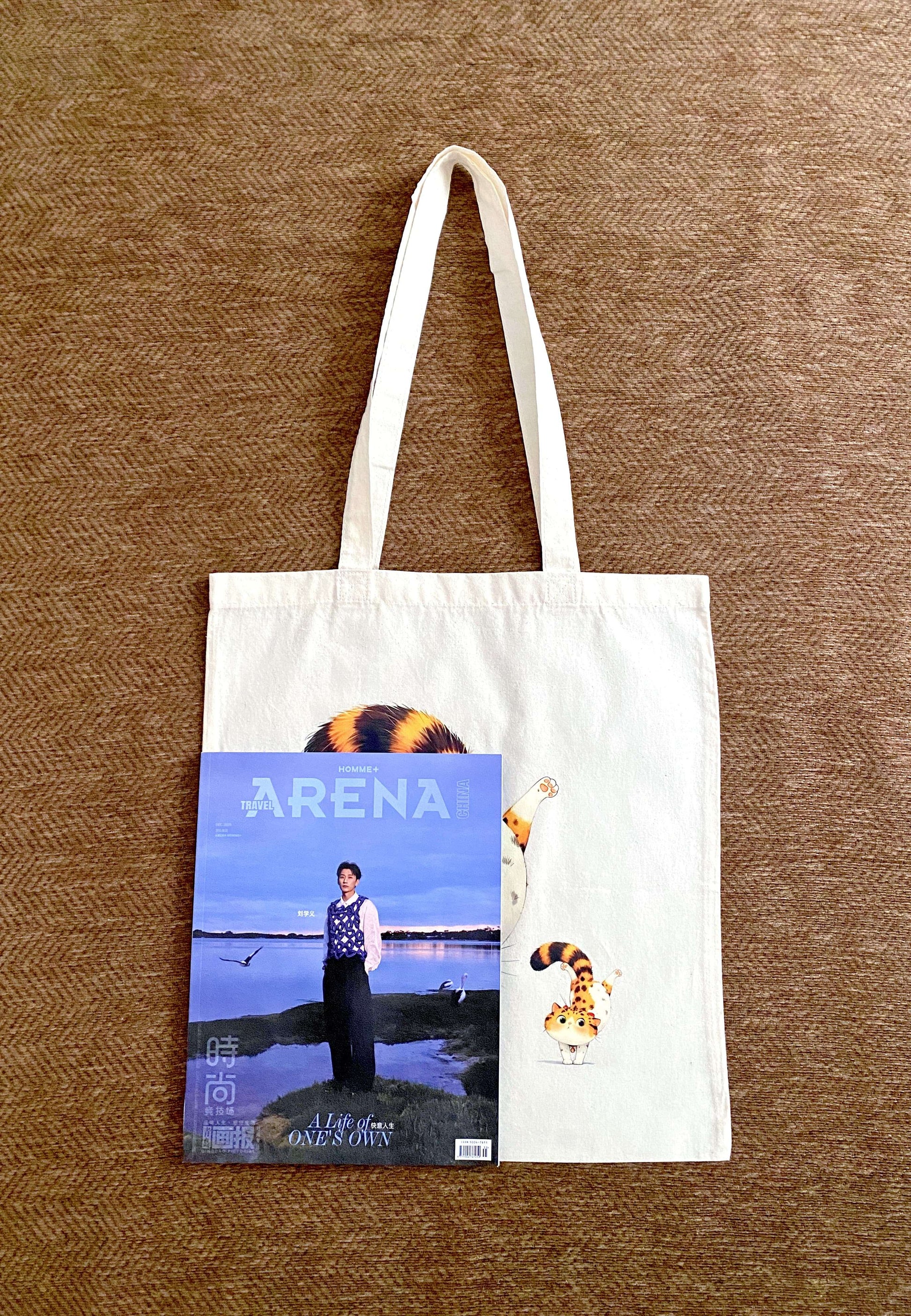 natural cotton carry bag with unique cat illustration for travel and beach days