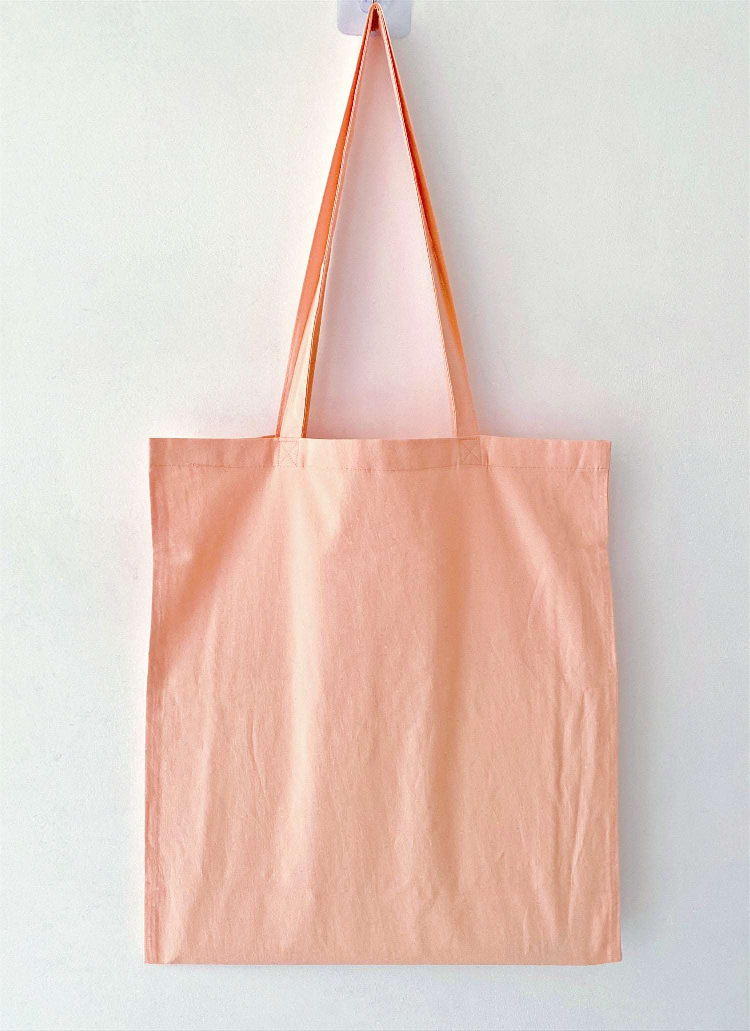 A durable yet soft alternative to wrapping paper, using this beautiful embroidered bag to hold a present makes the packaging a reusable gift itself.