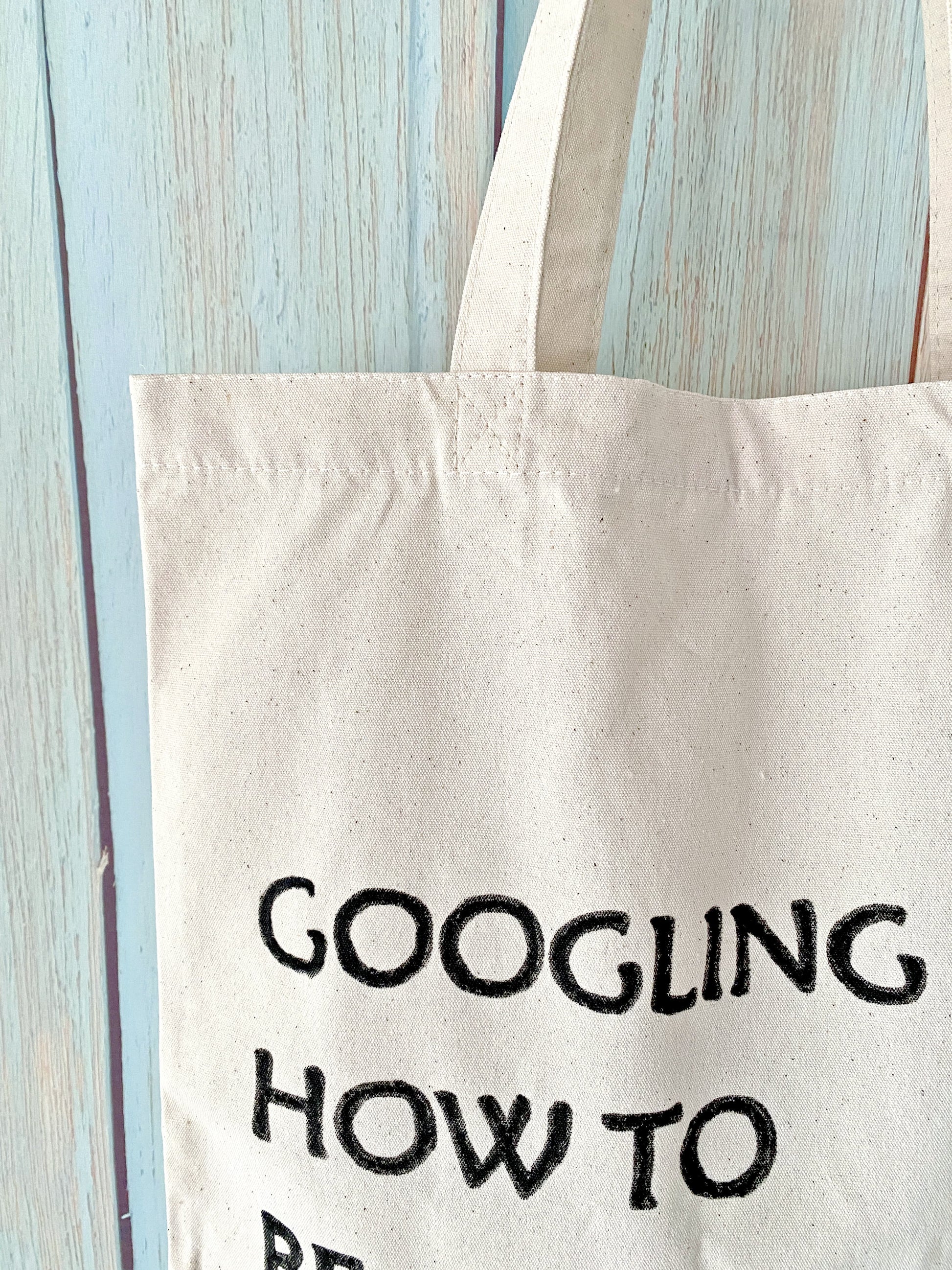 minimalist tote bag with motivational handwritten designs