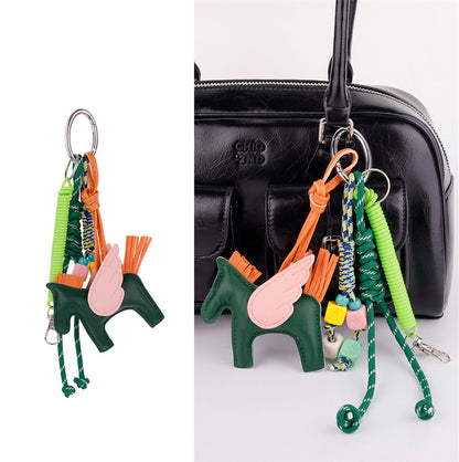 Whimsical pony bag embellishment on a vintage shoulder purse