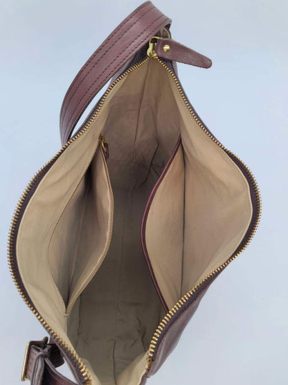 Leather purse styled for a museum visit and lunch in town