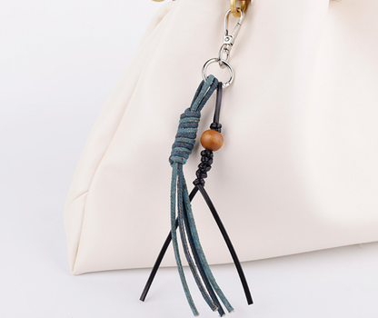 Unique bag charm with beads and a long tassel