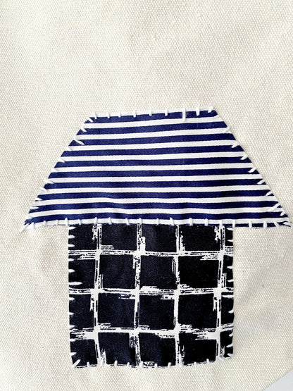 Lightweight fabric bag designed for comfortable shoulder carry