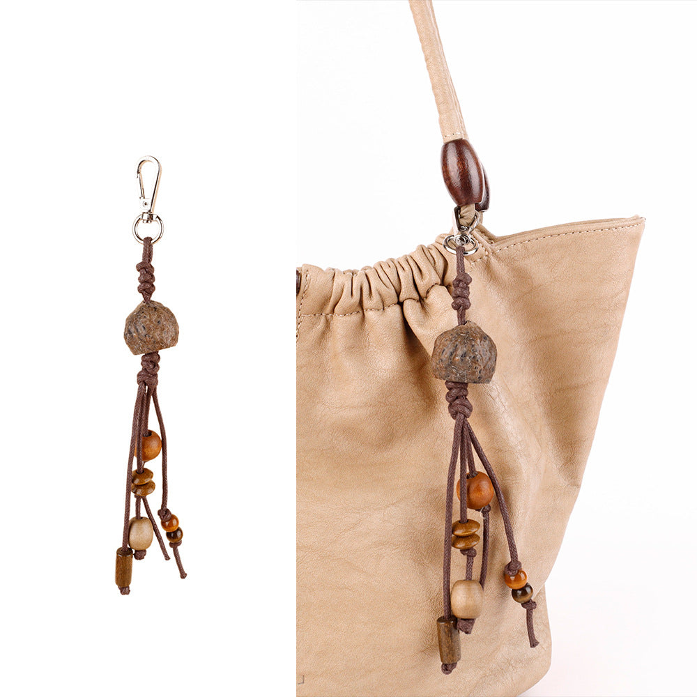 Unique handmade hanging charm for a casual handbag
