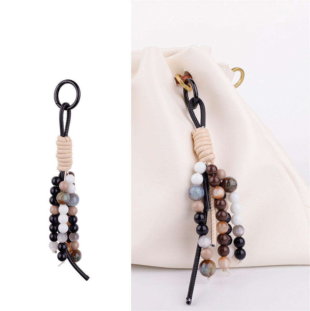 Artistic bag decoration and keychain gift idea packaged for a creative studio opening