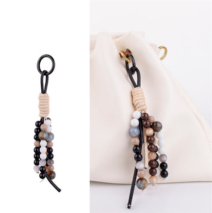 Artistic bag decoration and keychain gift idea packaged for a creative studio opening