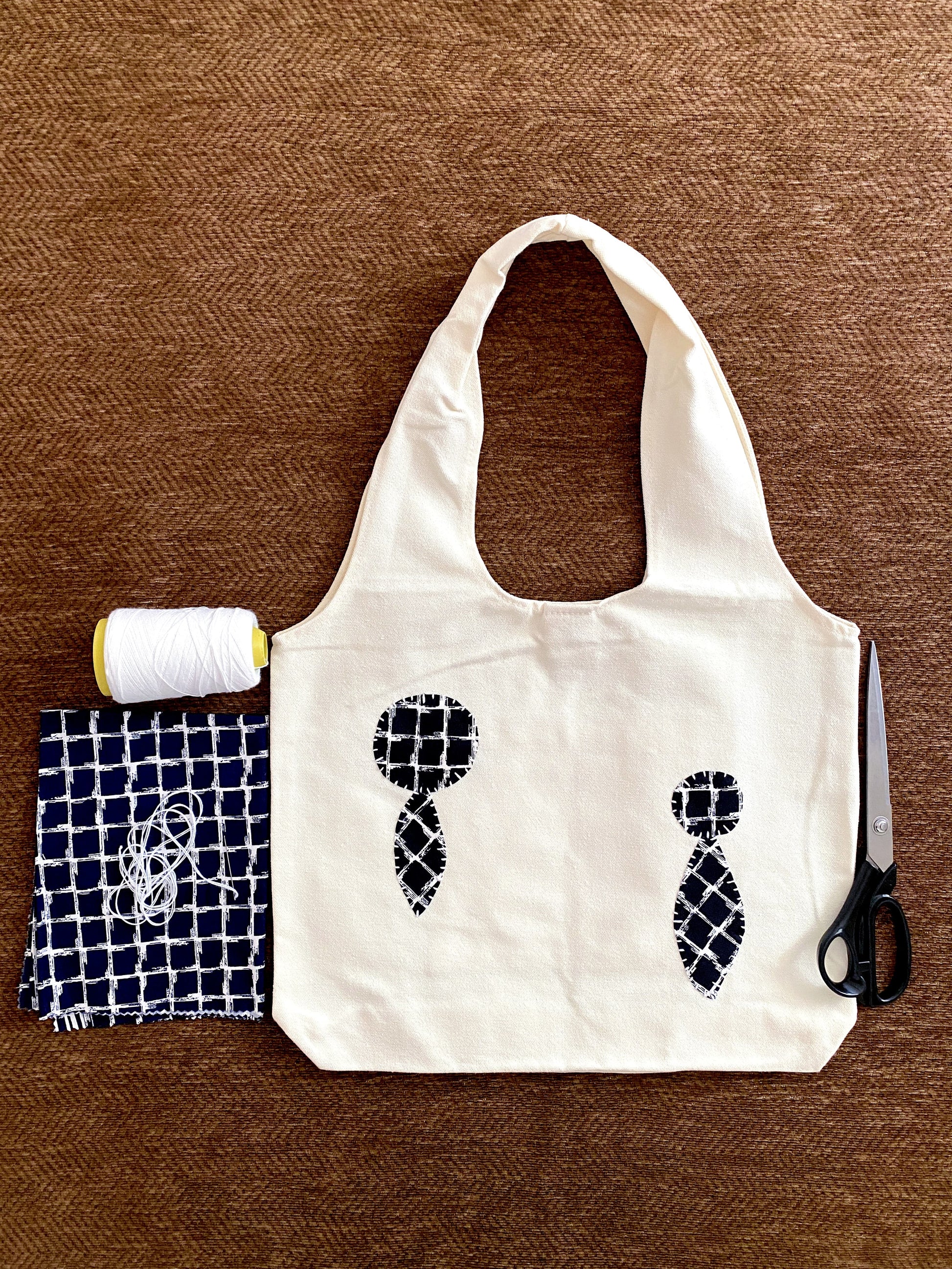 Patchwork detail canvas tote styled as a unique gift for creative lifestyle lovers