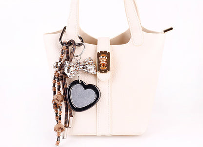 Unique handbag accessory made with natural wooden beads