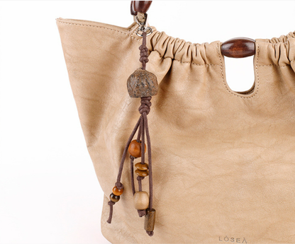 Wood bead and seed pod keychain for a bohemian style