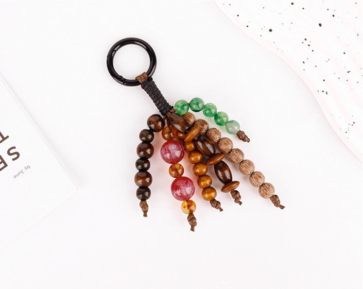 Small natural charm adding detail to a canvas tote