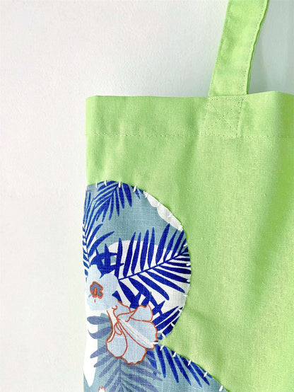 A spacious, lightweight tote with eco-friendly cotton and a hand-stitched patchwork design—perfect for gifting or adding an artisanal touch to your everyday style.