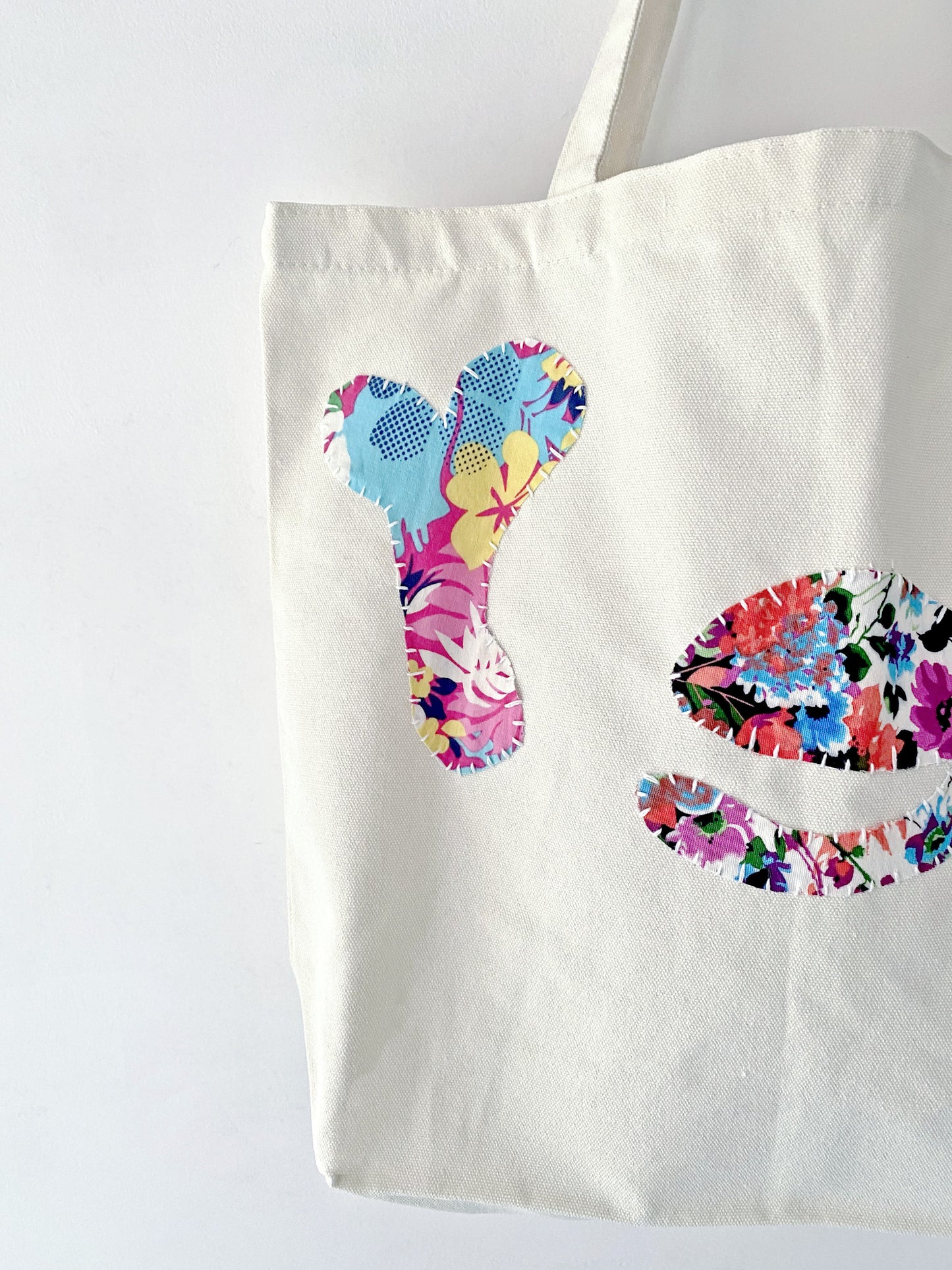 Letter motif tote bag for personal style expression