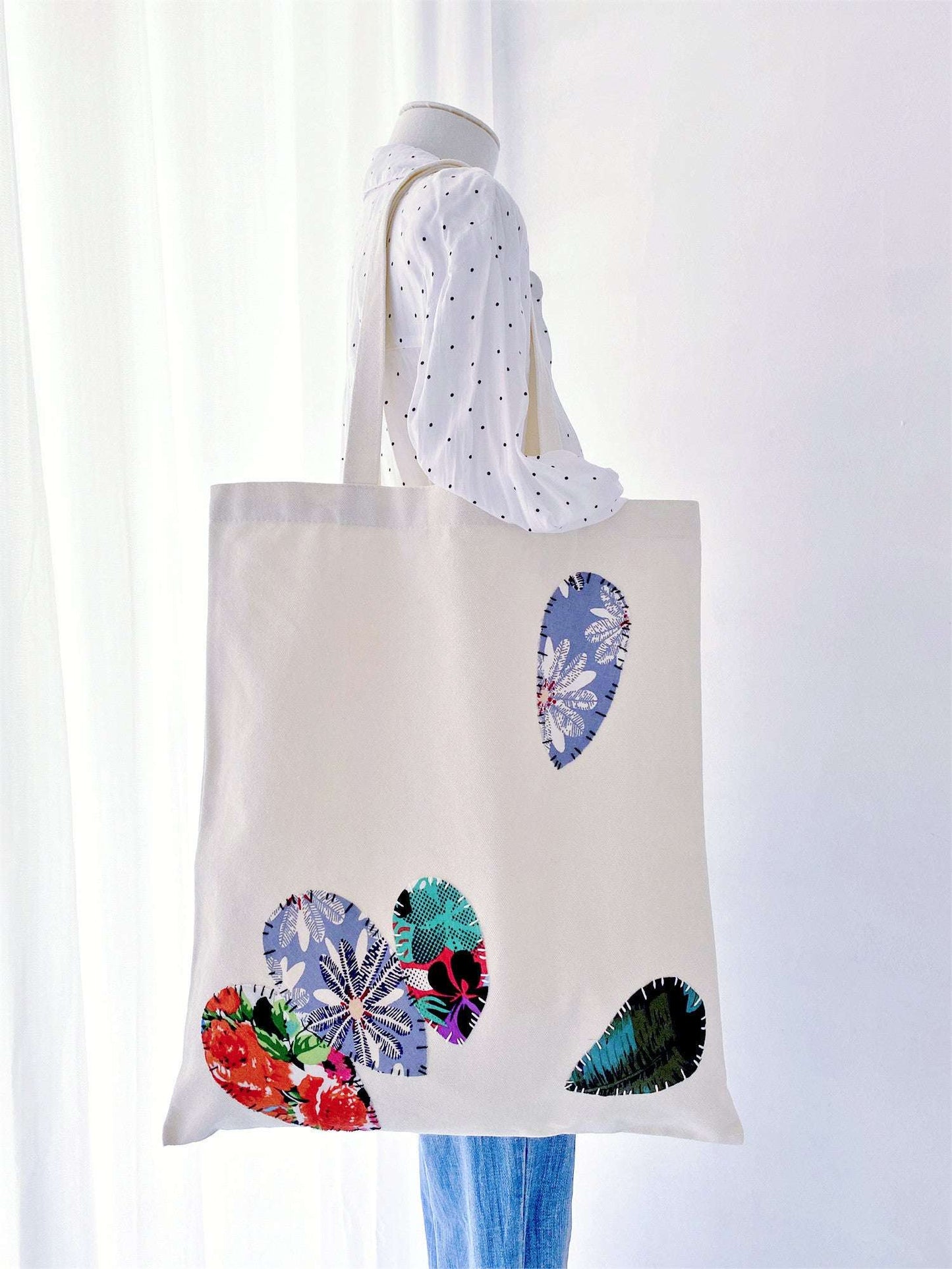 Gift a spacious, durable tote that reflects the values of sustainability and style—this canvas bag is perfect for those who value conscious choices.