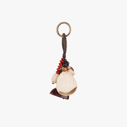 Fruit shell and wood bead bag hanging charm