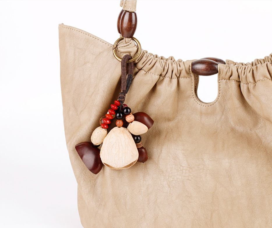 Handmade nature inspired bag accessory with seeds