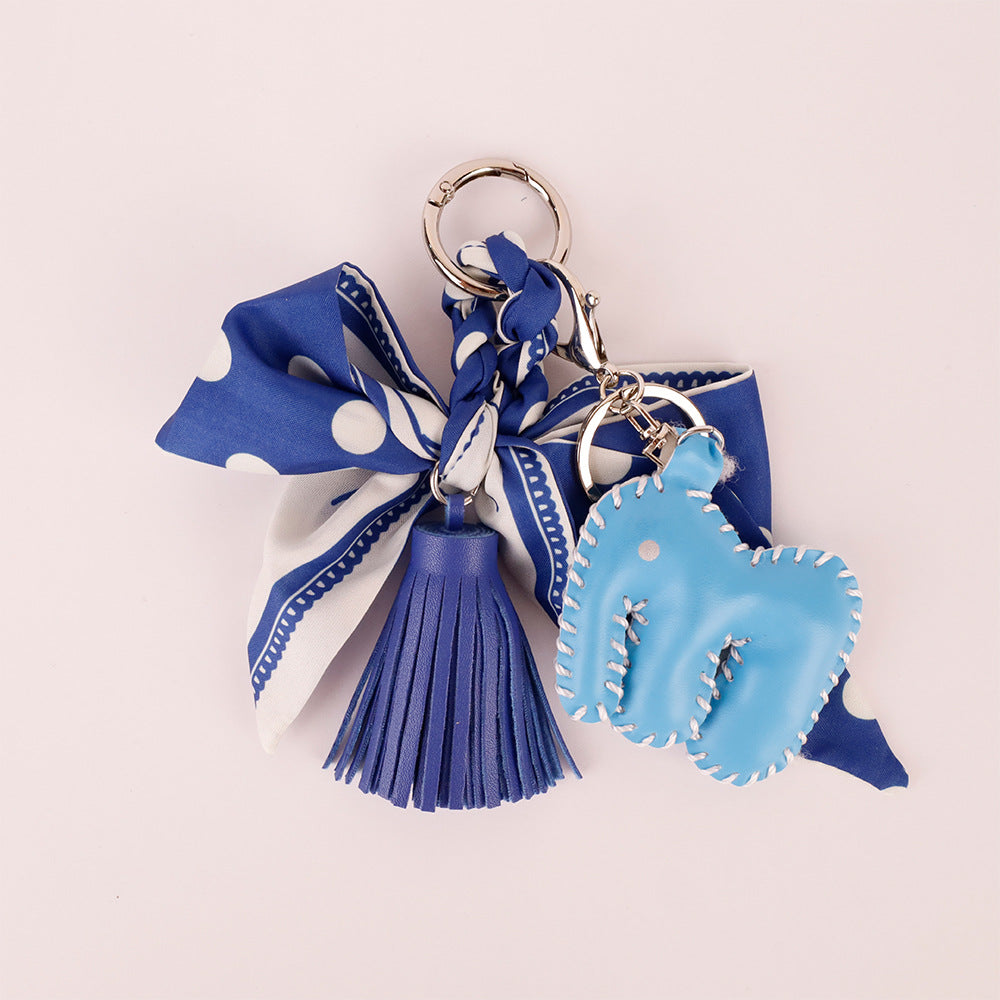 Polka dot handbag accessory with a soft bow