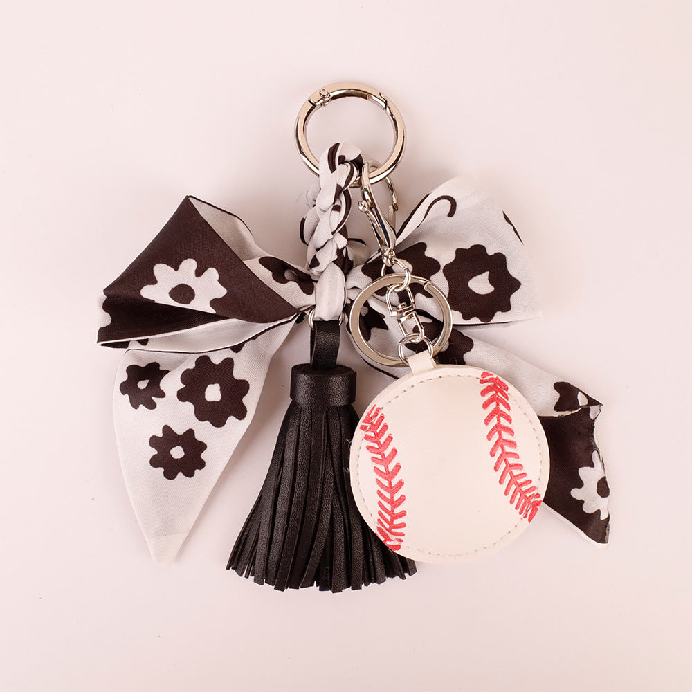 Handmade black ribbon bag accent with smooth silk texture