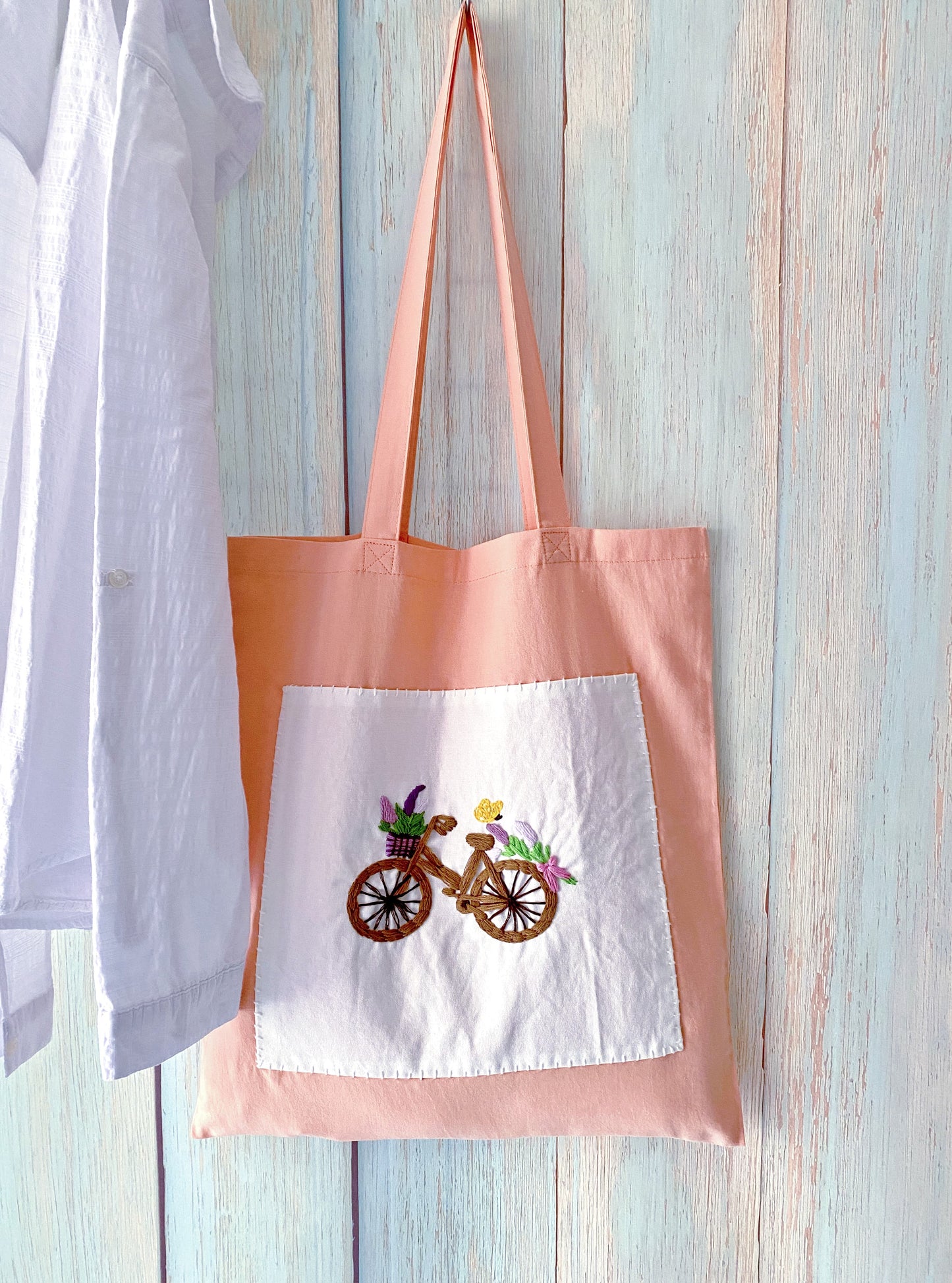 soft cotton shoulder tote with quiet embroidered detail for slow lifestyle outfits