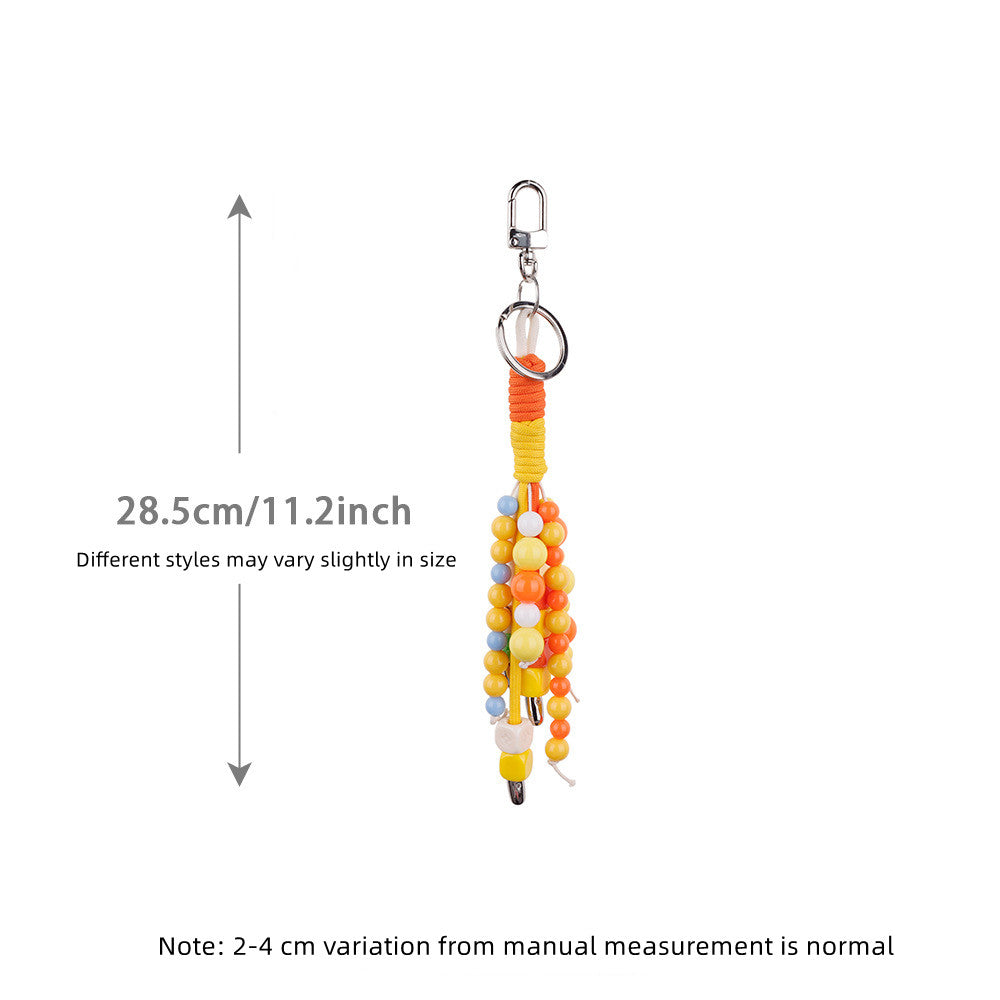 Warm-colored beads used to personalize an everyday bag