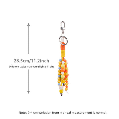 Warm-colored beads used to personalize an everyday bag