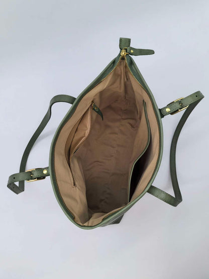 Genuine leather office tote with space for A4 notebooks and a compact laptop.