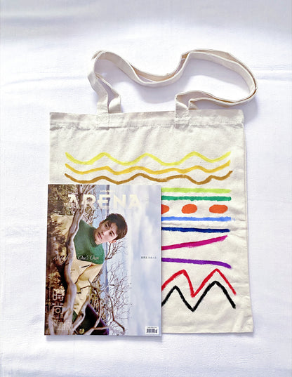 Effortless Parisian style outfit paired with a slouchy utility tote.