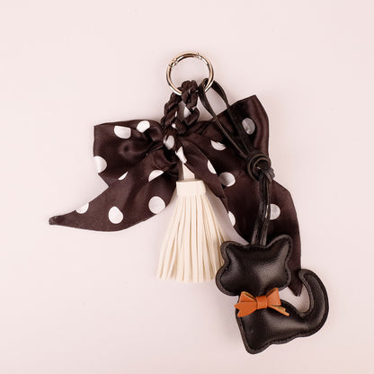Handmade scarf bow accessory with animal charm