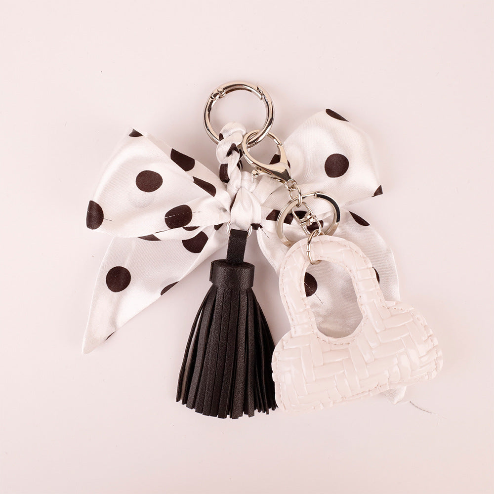 Cute animal charm with a retro scarf bow