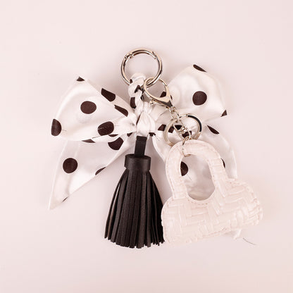 Cute animal charm with a retro scarf bow