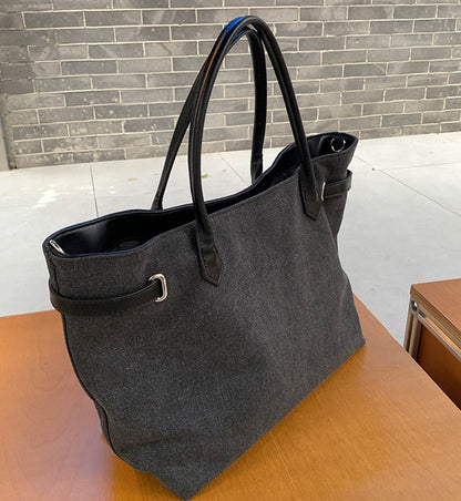 Canvas tote bag with spacious interior for personal items