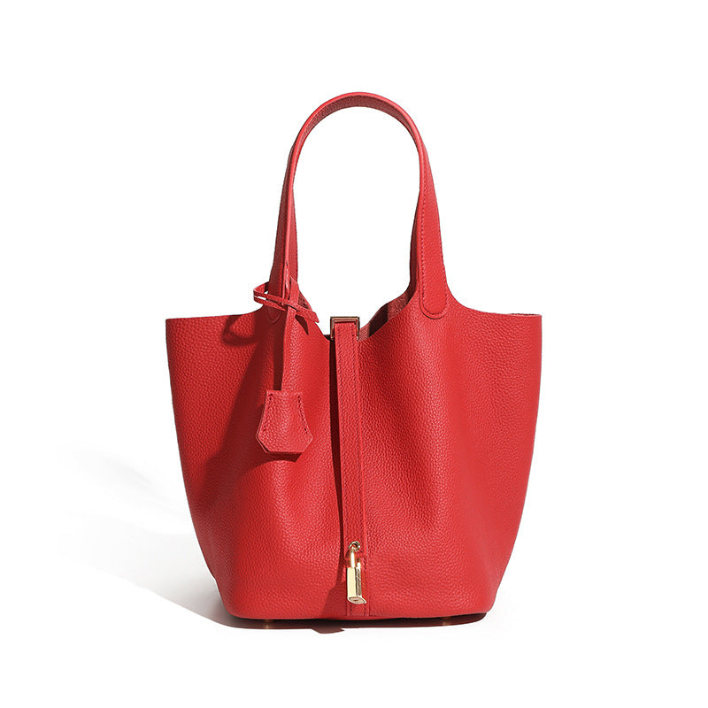 structured leather mini bucket purse with minimalist fashion design