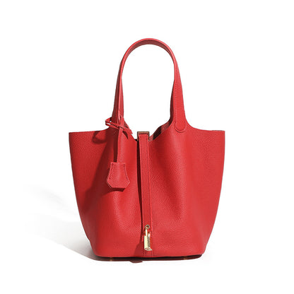 structured leather mini bucket purse with minimalist fashion design