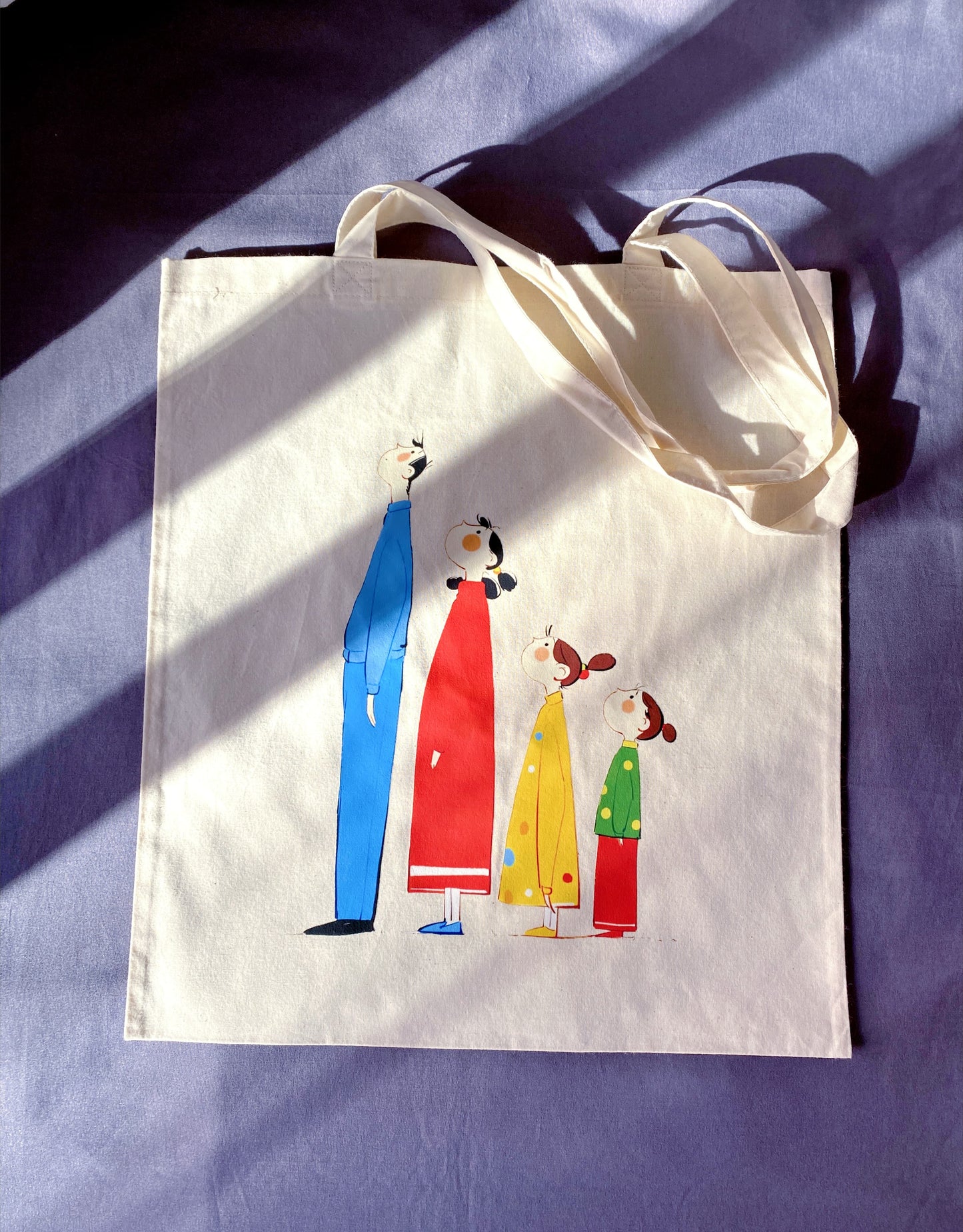 Chic hand-printed cotton bag used as a sustainable bridesmaids or wedding favor.